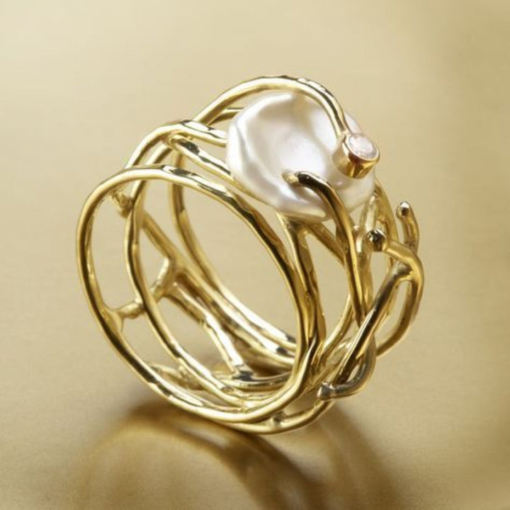 Elegant Gold and Pearl Dunne Ring